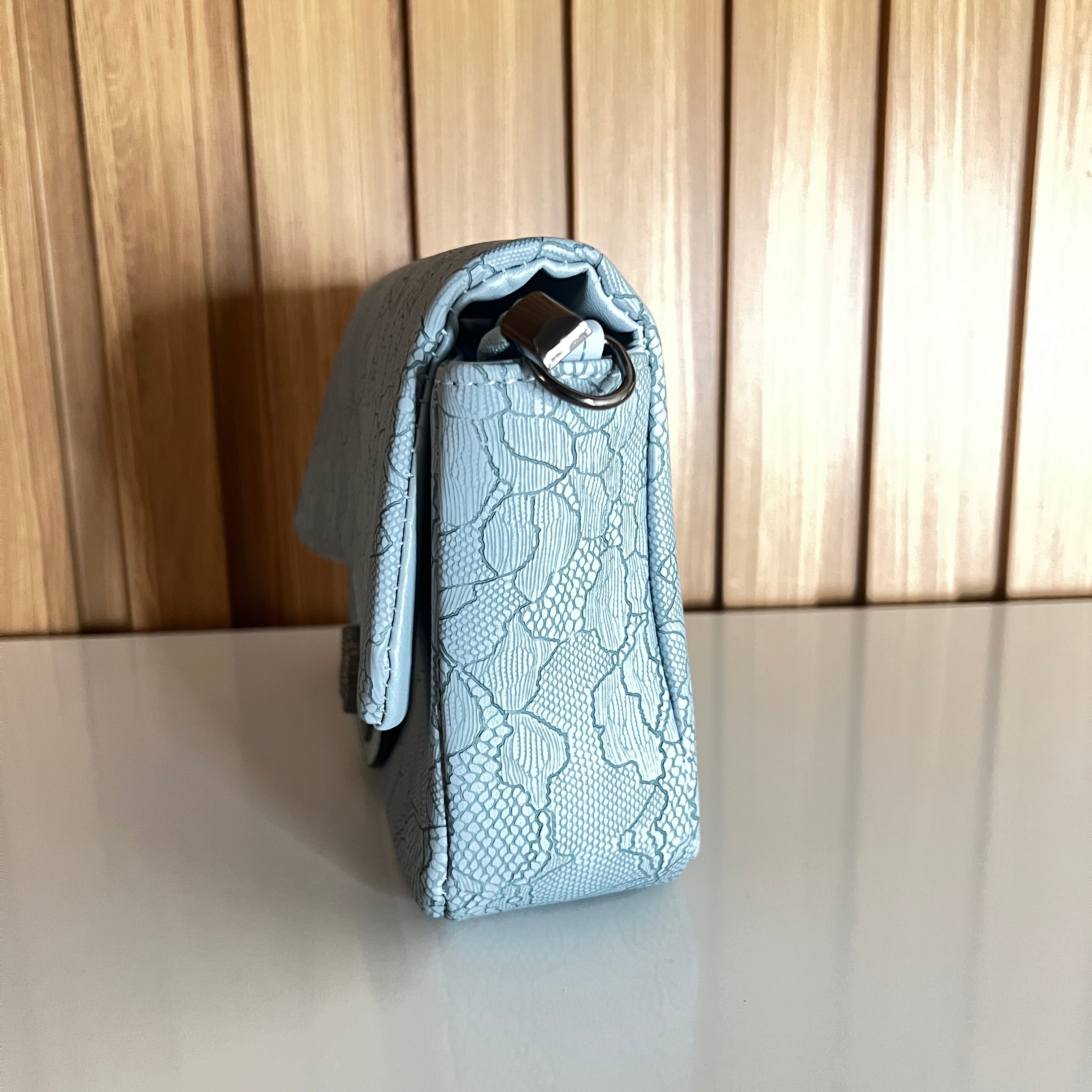 Powder Blue Floral Lace-Embossed Crossbody Bag – Flower Turn-Lock Clasp by Meraki by Emaan Pakistan