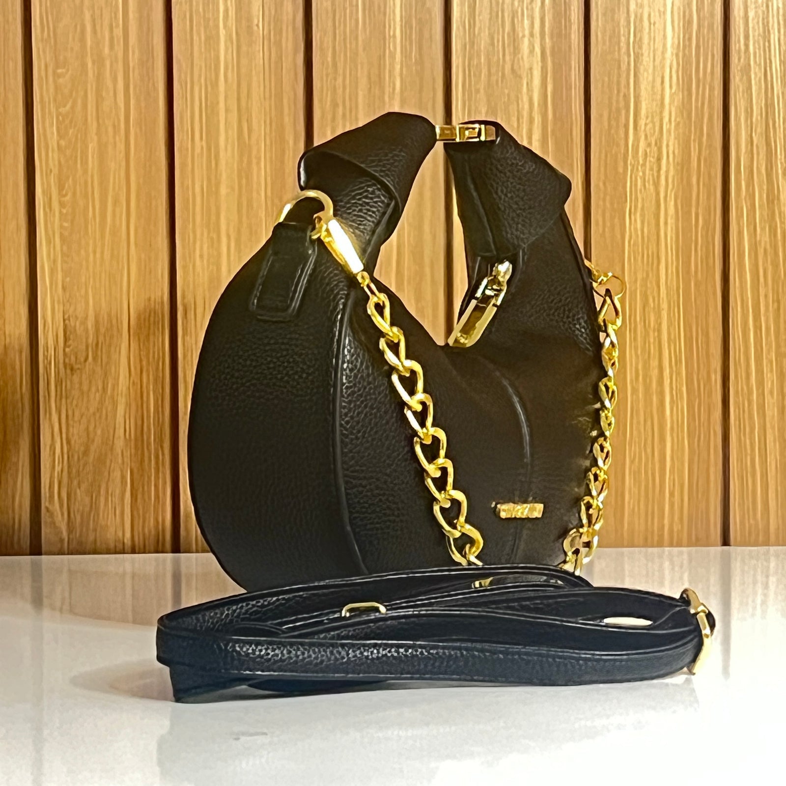 Black Pebbled Leather Crescent Hobo Bag with Gold Chain - Side View
