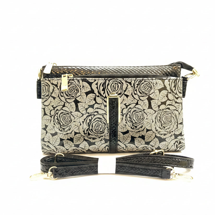 Black structured clutch bag with silver top handle for women in Pakistan – Meraki by Emaan