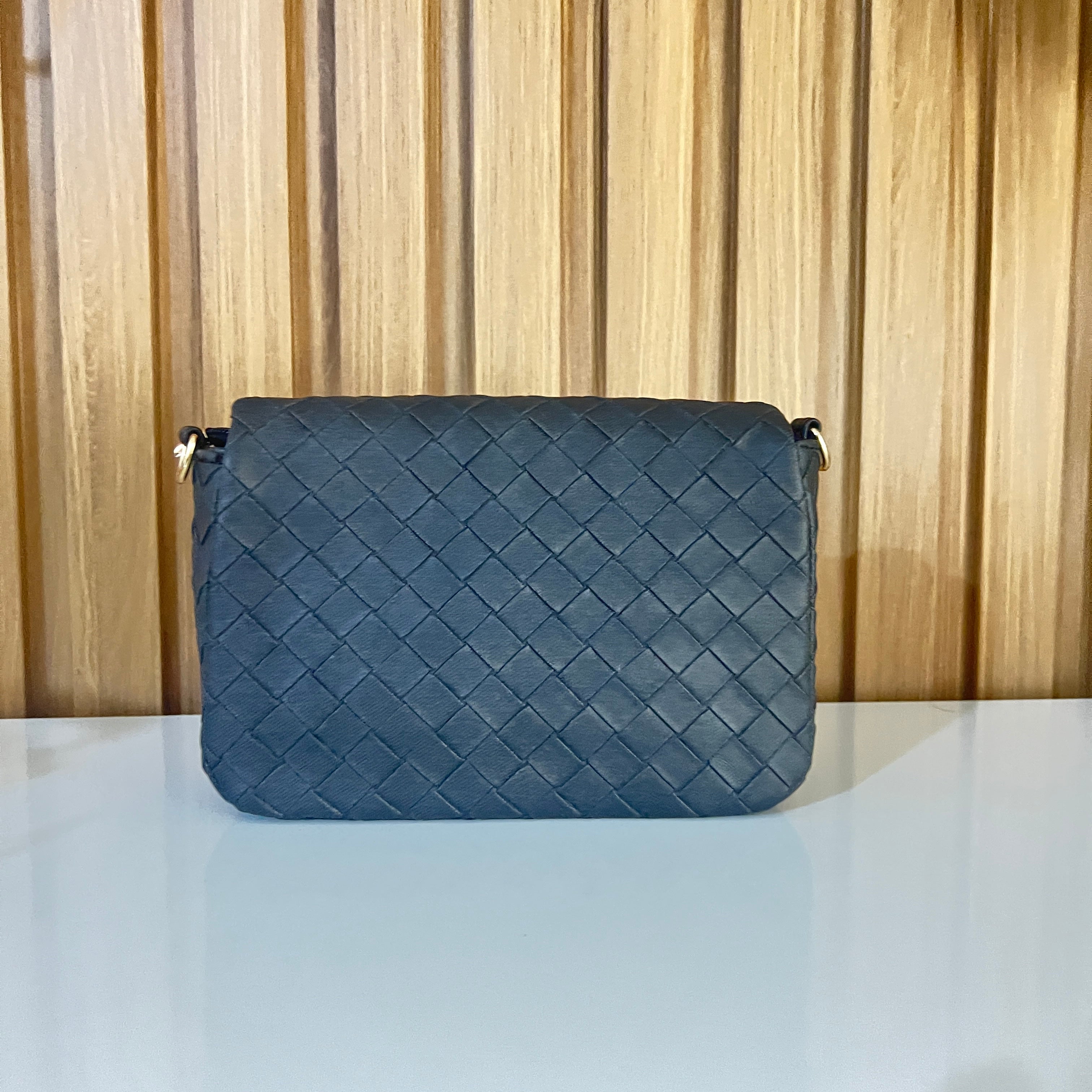 Black woven crossbody flap bagback view – Meraki by Emaan Pakistan