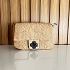 Cream beige floral embossed crossbody bag front view – Meraki by Emaan Pakistan