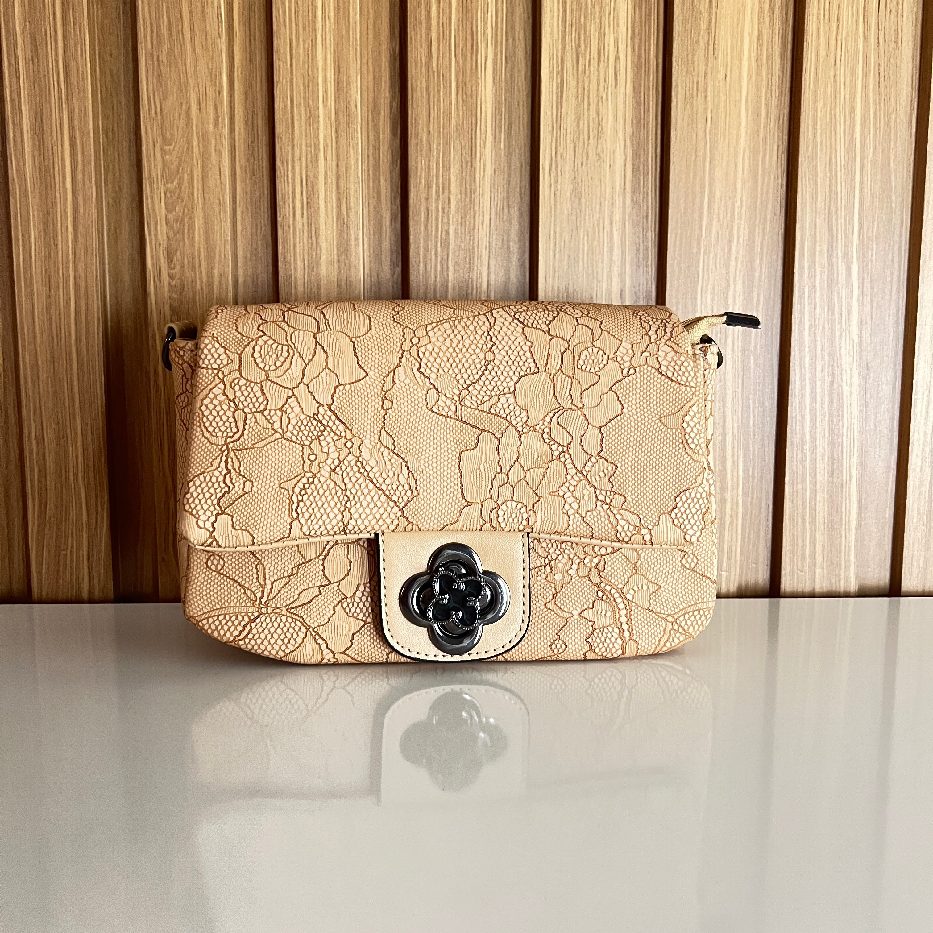 Cream beige floral embossed crossbody bag front view – Meraki by Emaan Pakistan