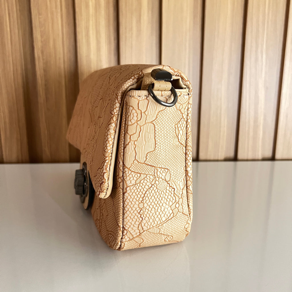 Cream beige floral embossed crossbody bag side view – Meraki by Emaan Pakistan