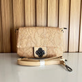Cream floral lace-embossed crossbody bag front view with flower clasp and strap – Meraki by Emaan Pakistan