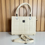 Cream quilted structured bag front view with crossbody strap – Meraki by Emaan Pakistan
