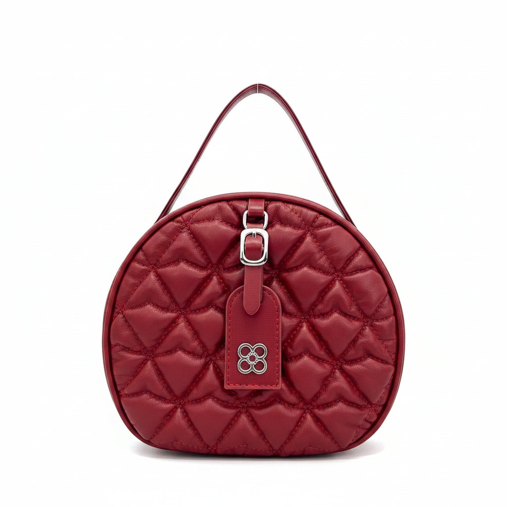 Round Quilted Vanity Bag with Chain Strap & Flower Logo – Women's Mini Crossbody in Pakistan