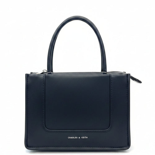Structured mini tote bag panel pocket top handle women black Pakistan – Meraki by Emaan