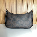 Logo Print Crescent Shoulder Bag – Brown & Black with Gold Chain Strap by Meraki by Emaan Pakistan - Back Side