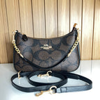 Logo Print Crescent Shoulder Bag – Brown & Black with Gold Chain Strap by Meraki by Emaan Pakistan - Front View with Mini and Long Strap 