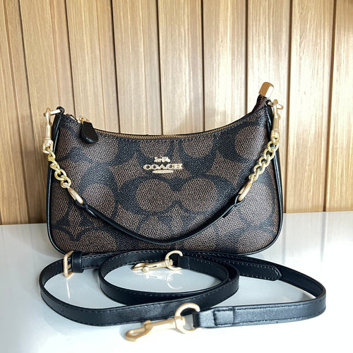 Logo Print Crescent Shoulder Bag – Brown & Black with Gold Chain Strap by Meraki by Emaan Pakistan - Front View with Mini and Long Strap 
