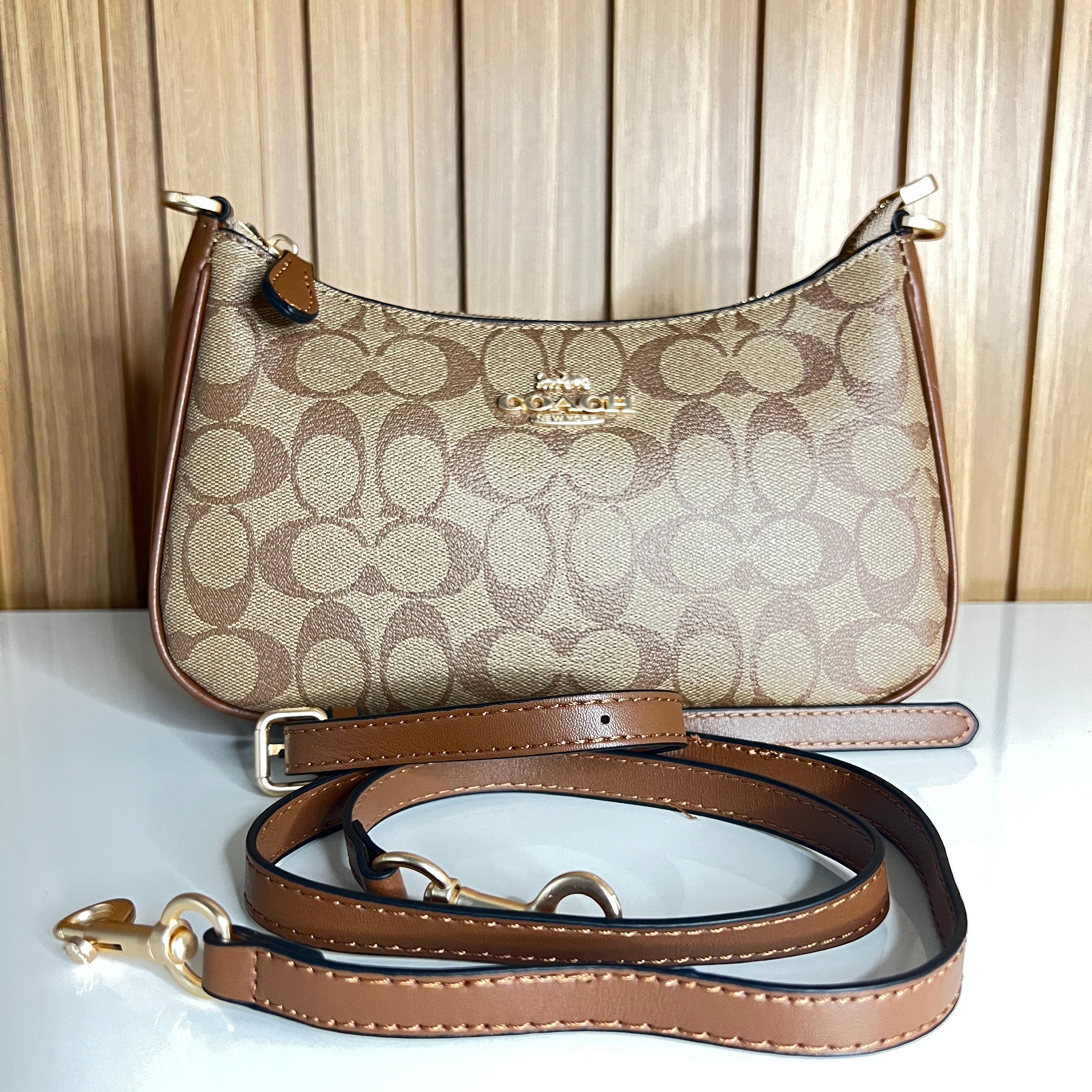 Logo Print Crescent Shoulder Bag – Khaki & Saddle with Gold Chain Strap by Meraki by Emaan Pakistan - Font View long Strap