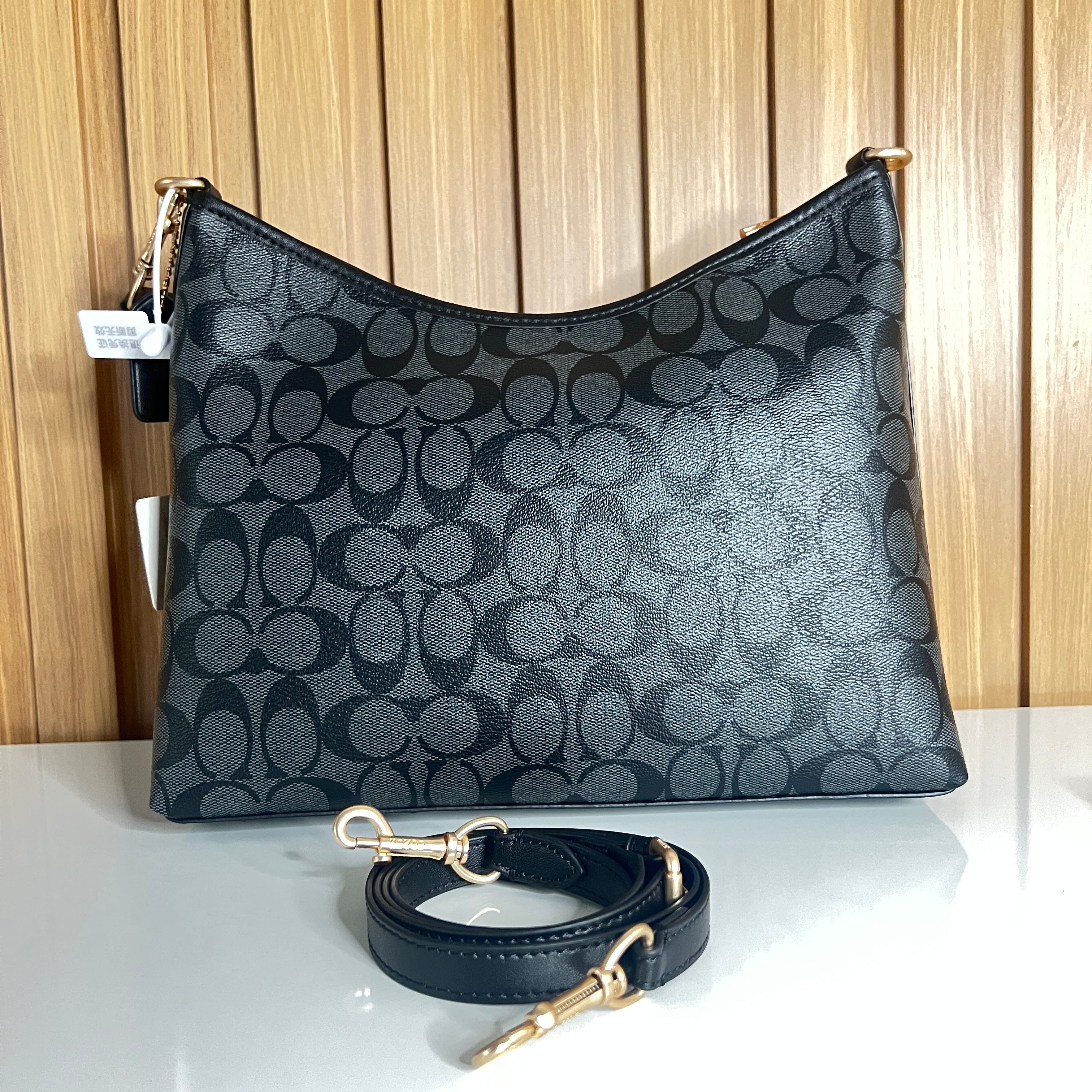 Logo Print Hobo Shoulder Bag – Charcoal & Black with Crossbody Strap by Meraki by Emaan Pakistan - Back View