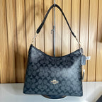 Logo Print Hobo Shoulder Bag – Charcoal & Black with Crossbody Strap by Meraki by Emaan Pakistan - Front View2