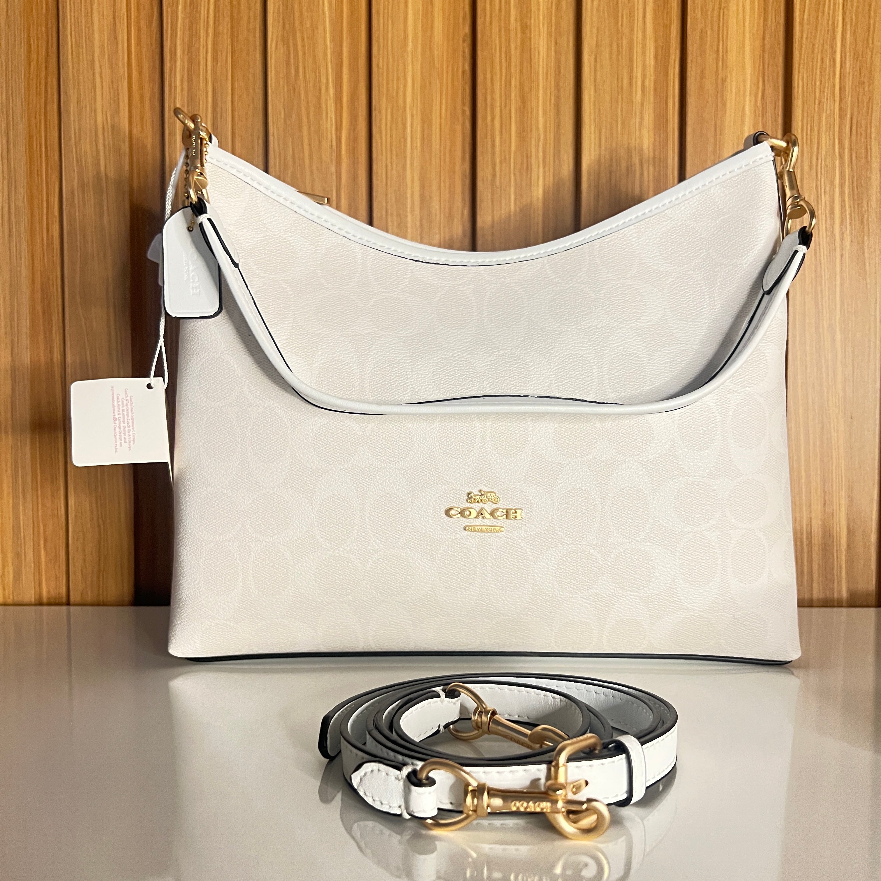 Logo Print Hobo Shoulder Bag – White & Chalk with Crossbody Strap by Meraki by Emaan Pakistan - Front View