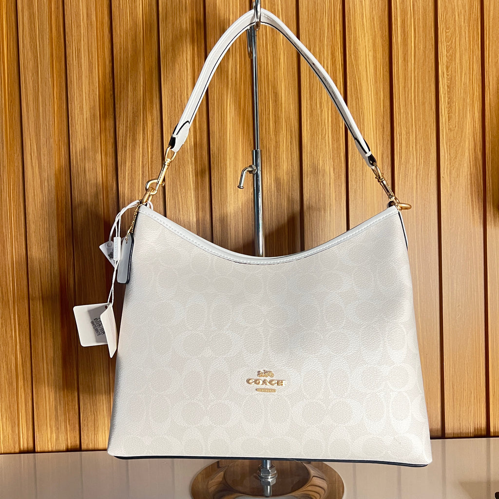 Logo Print Hobo Shoulder Bag – White & Chalk with Crossbody Strap by Meraki by Emaan Pakistan - Front View2