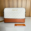 MK Signature Monogram Crossbody Camera Bag – Vanilla & Luggage Brown by Meraki by Emaan Pakistan - Front View