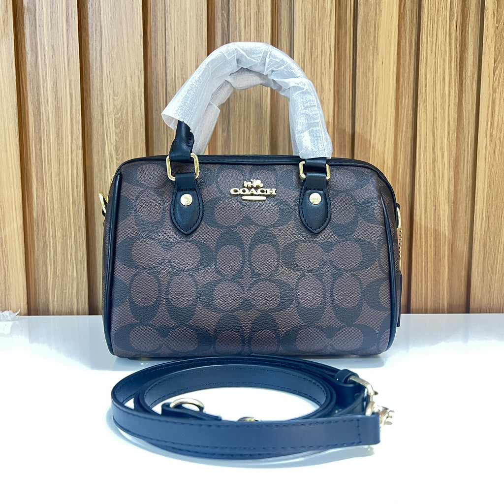 Signature Monogram Mini Barrel Bag – Brown & Black Top Handle & Crossbody Bag by Meraki by Emaan Pakistan - Front View with Strap