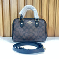 Signature Monogram Mini Barrel Bag – Brown & Black Top Handle & Crossbody Bag by Meraki by Emaan Pakistan - Front View with Strap