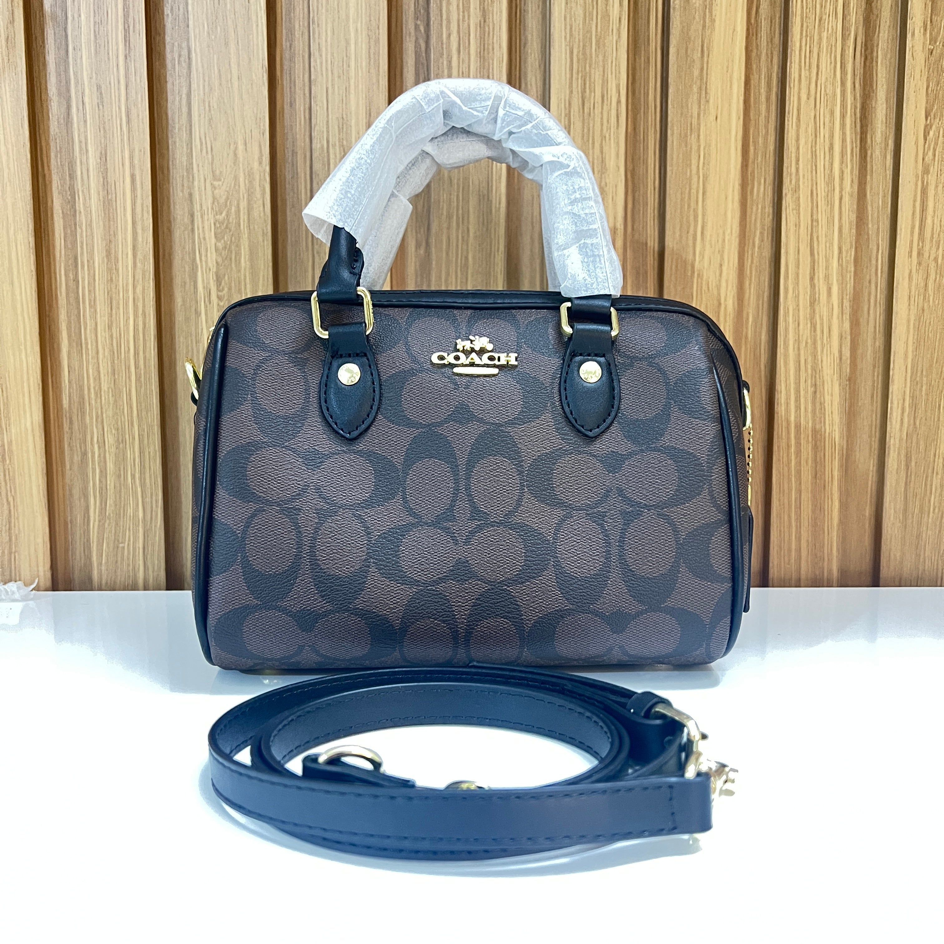 Signature Monogram Mini Barrel Bag – Brown & Black Top Handle & Crossbody Bag by Meraki by Emaan Pakistan - Front View with Strap