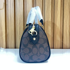Signature Monogram Mini Barrel Bag – Brown & Black Top Handle & Crossbody Bag by Meraki by Emaan Pakistan - Side view