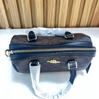 Signature Monogram Mini Barrel Bag – Brown & Black Top Handle & Crossbody Bag by Meraki by Emaan Pakistan - Top View