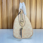 Signature Monogram Mini Barrel Bag – Sand & Blush Top Handle & Crossbody Bag by Meraki by Emaan Pakistan - Side View