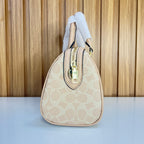 Signature Monogram Mini Barrel Bag – Sand & Blush Top Handle & Crossbody Bag by Meraki by Emaan Pakistan - Zip Side View