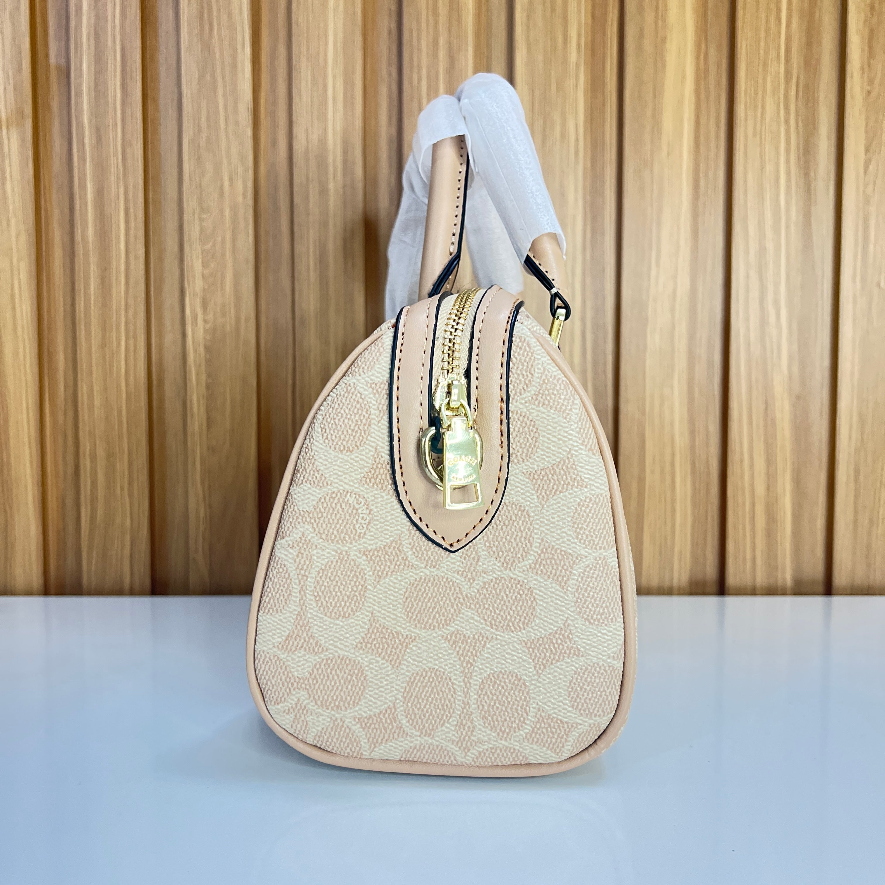 Signature Monogram Mini Barrel Bag – Sand & Blush Top Handle & Crossbody Bag by Meraki by Emaan Pakistan - Zip Side View