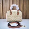 Signature Monogram Mini Barrel Bag – Top Handle & Crossbody Handbag by Meraki by Emaan Pakistan - Front View with strap
