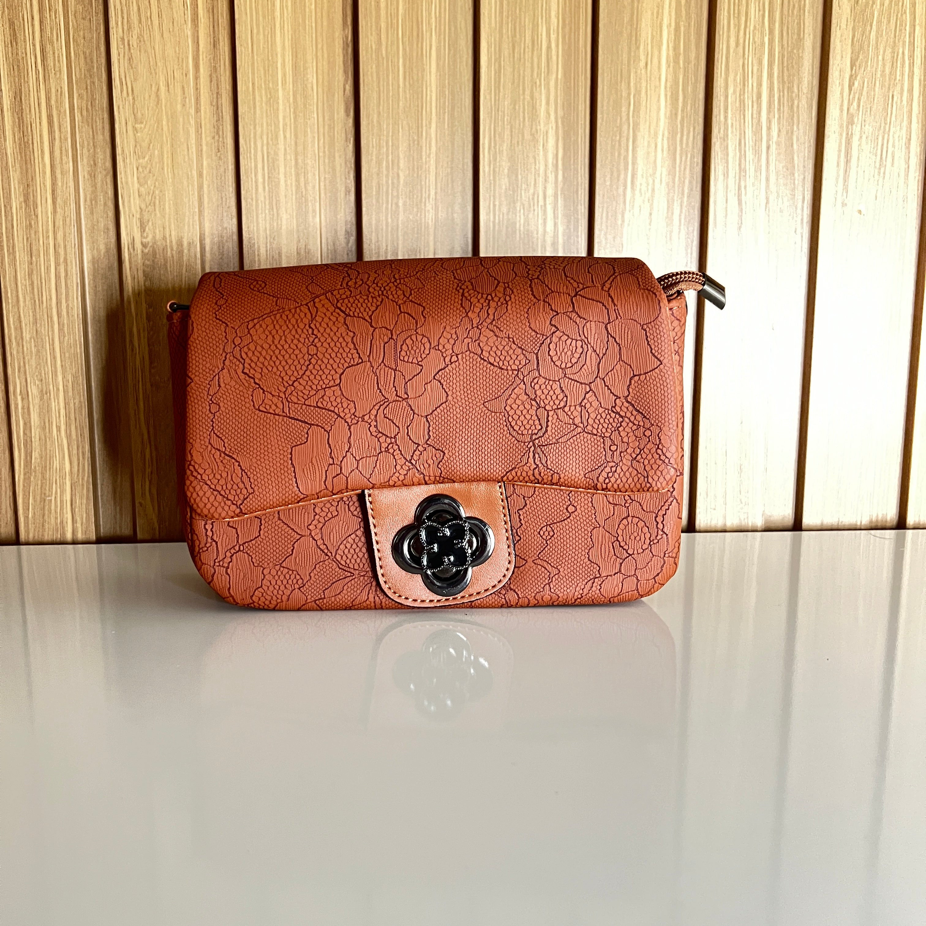Tan floral crossbody bag front view with adjustable strap 2 – Meraki by Emaan Pakistan