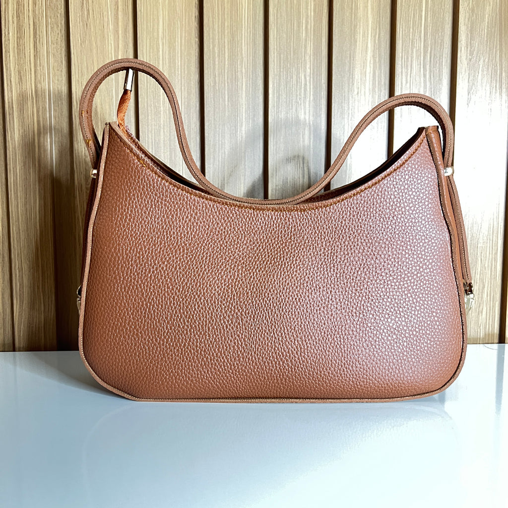 Tan pebbled leather crescent hobo shoulder bag front  – Meraki by Emaan Pakistan