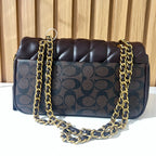 Black quilted chain shoulder bag for women front view