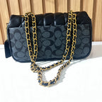 Black quilted chain shoulder bag for women back view