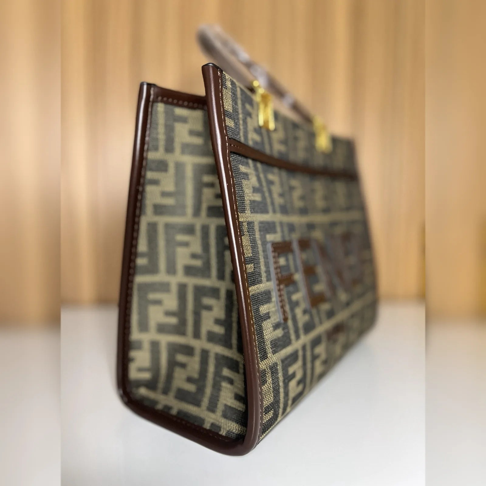 Side profile showing depth of structured brown tote bag