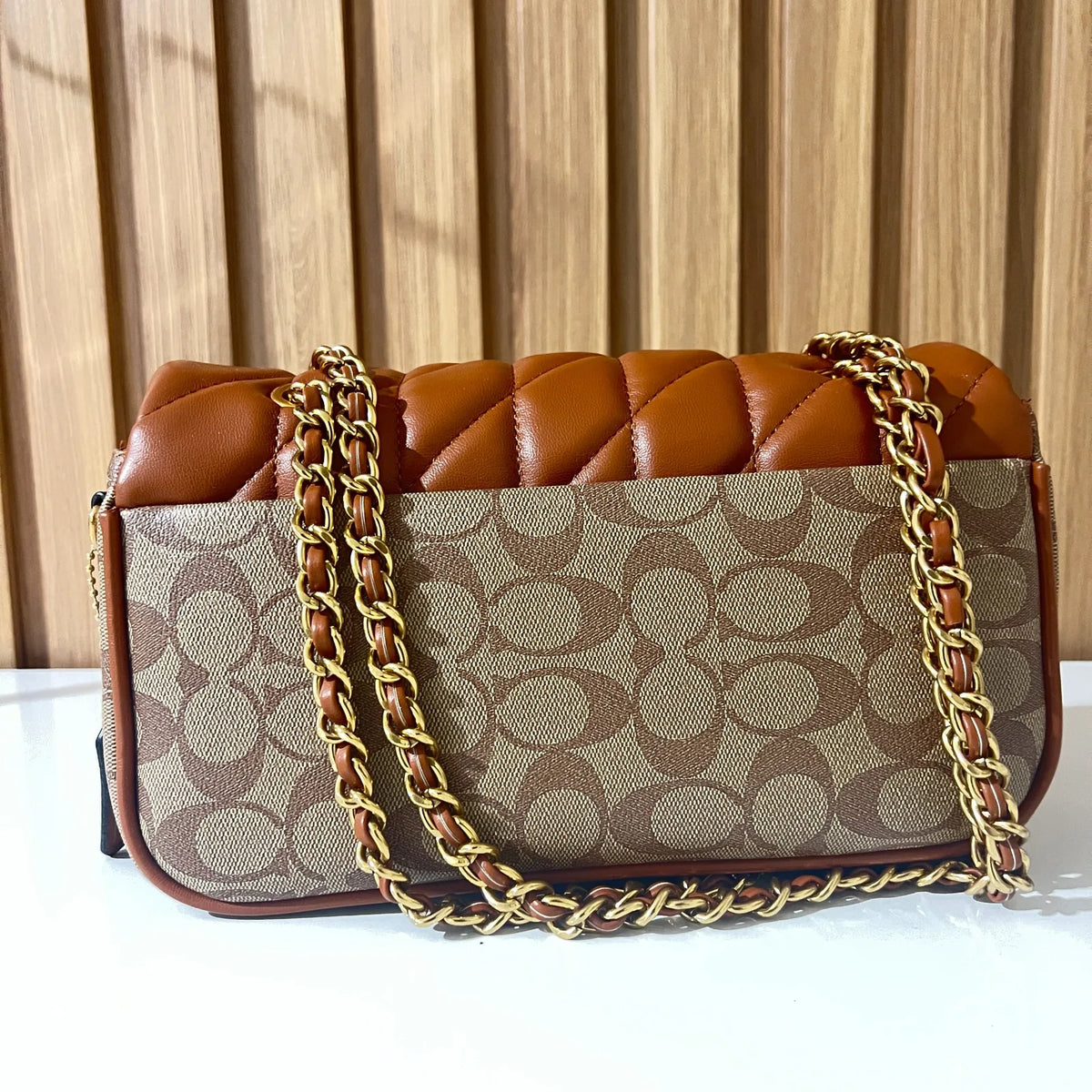 Cognac quilted chain shoulder bag for women back view with chain strap