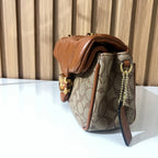 Cognac quilted chain shoulder bag for women side view