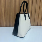 Cream and black embroidered tote handbag side profile